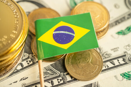Stack of coins money with Brazil flag, finance banking concept.